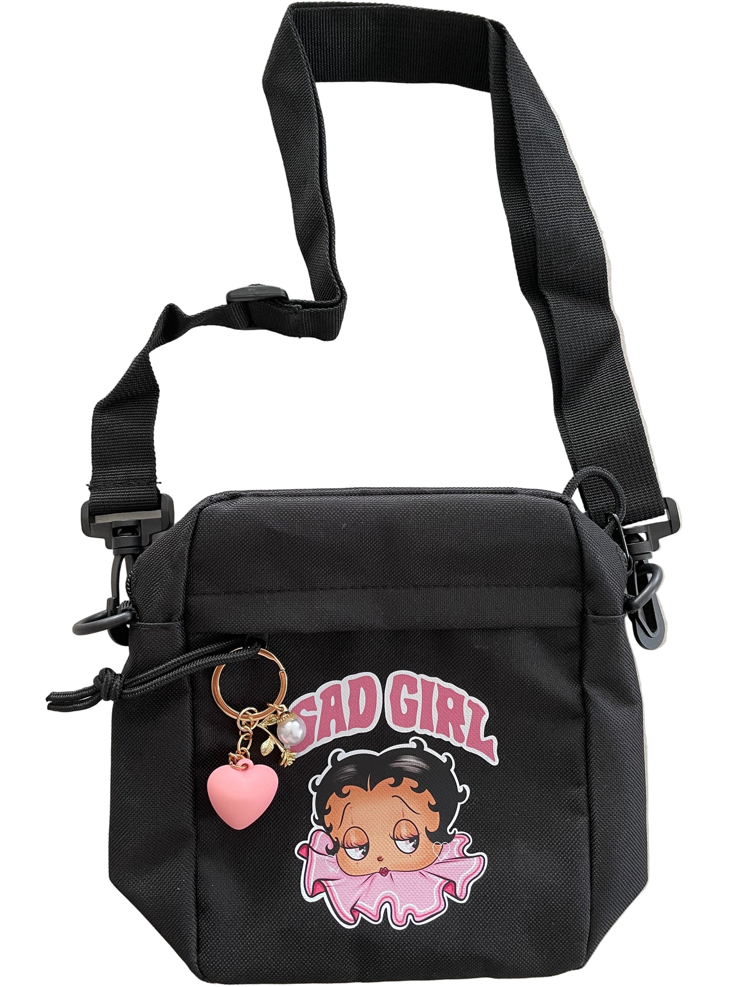Black bag with cartoon character and sad Girl betty text on a light background