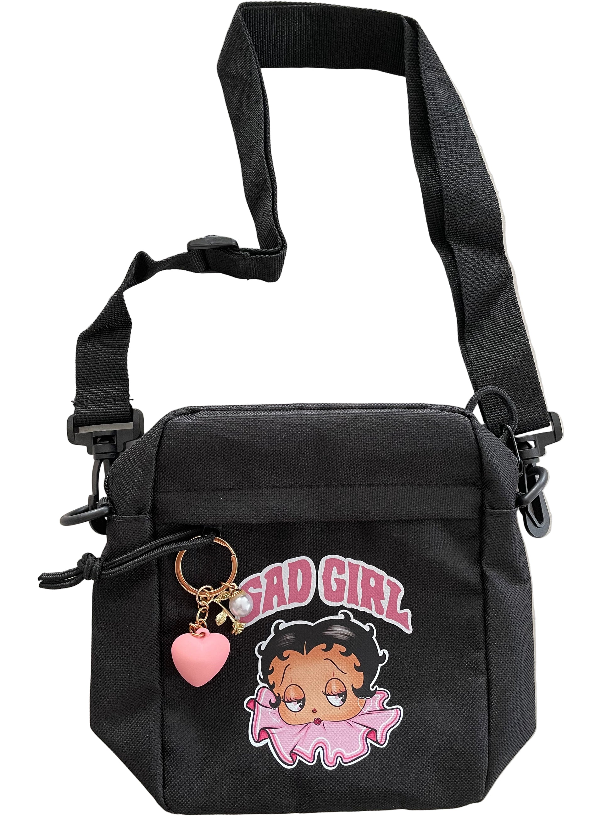 Black bag with cartoon character and sad Girl betty text on a light background